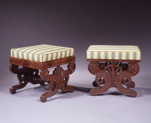 CARSWELL RUSH BERLIN - assembled pair of carved mahogany upholstered foot - Footstool